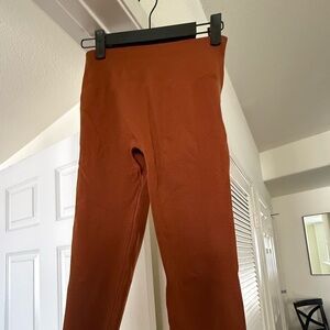 Alphalete Women's Leggings in Rust Orange